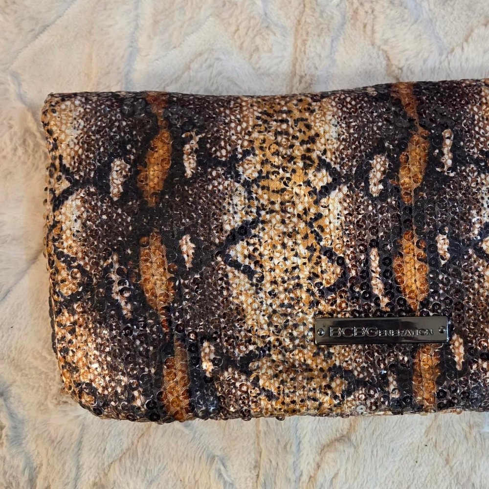 BCBG Generation black and brown snake print clutch purse handbag wallet‎